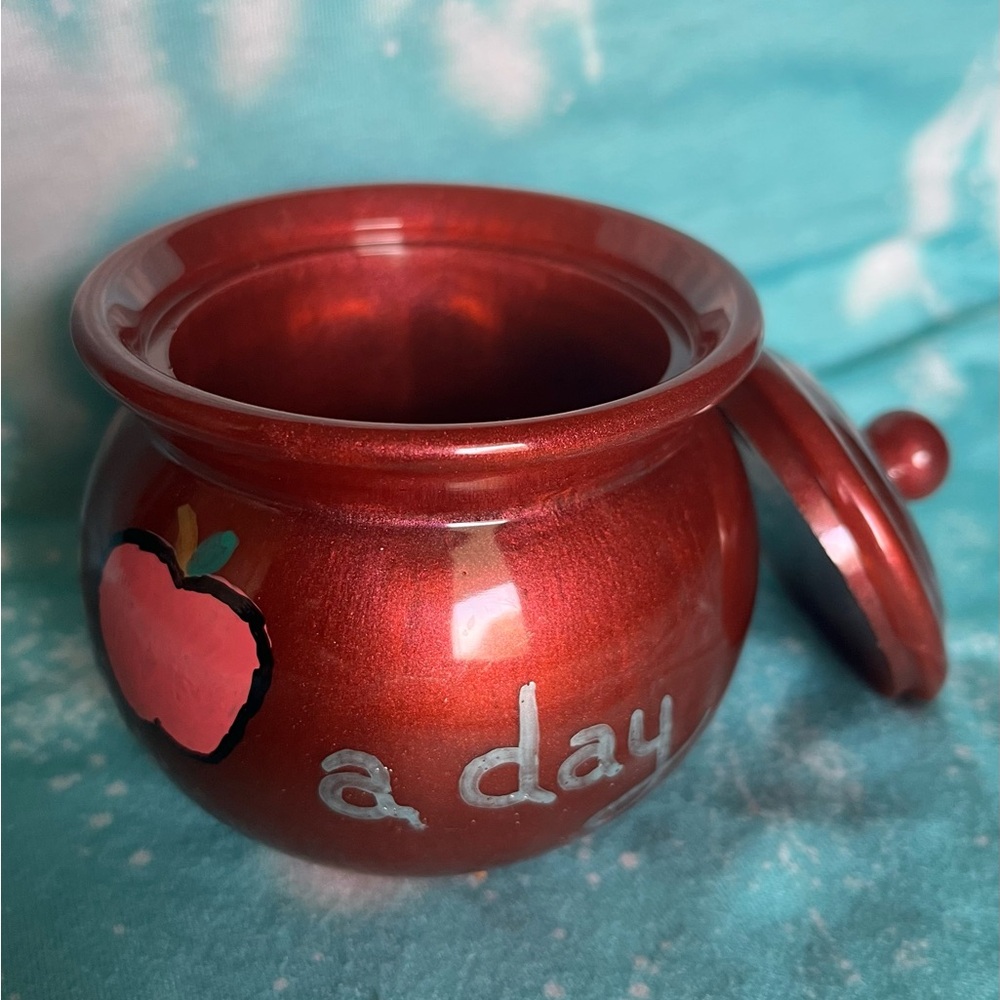 Red Ceramic Jar with Apple Design